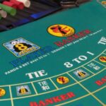 Which stake levels apply across online baccarat tables?